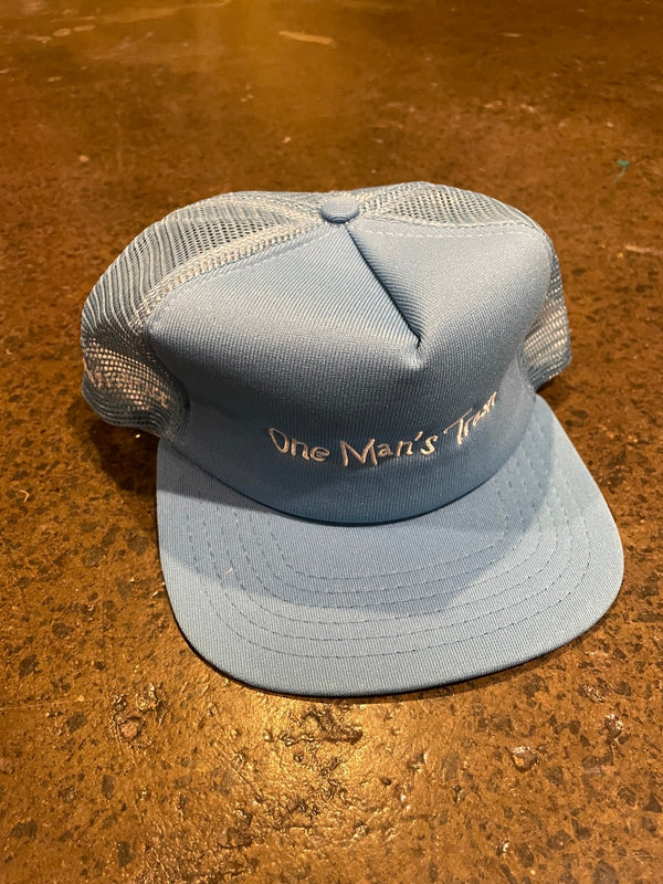 Comma, 'One Man's Trash' Trucker Hat