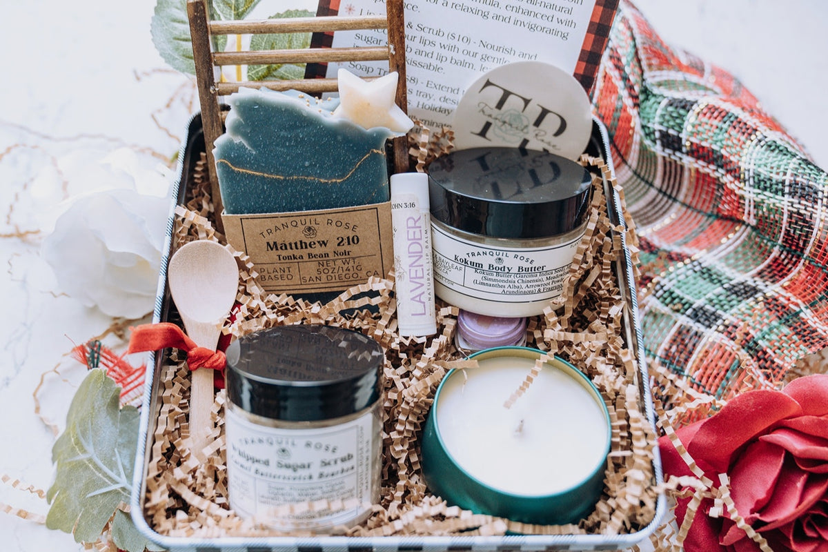 A box of self-care products: masks, candles & more