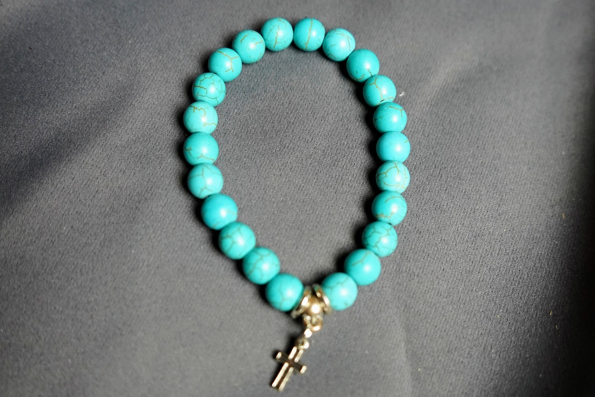 Lava Rock bracelet of St. Damien (Teal beads)