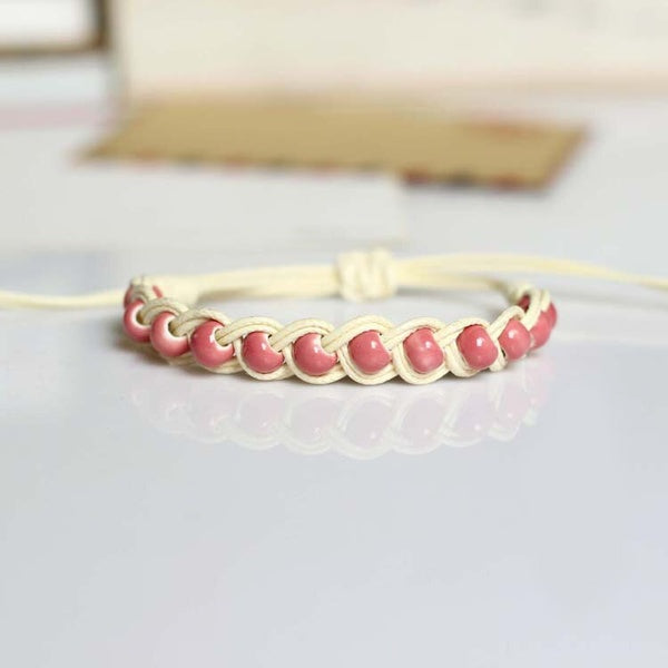 Pink Braid Wrapped Bead Bracelet